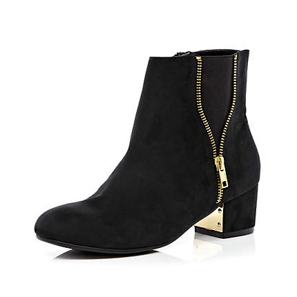 black booties with gold zipper